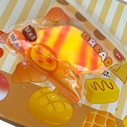 Gniotek squishy rogalik maślany chlebek 12 cm 1 szt.