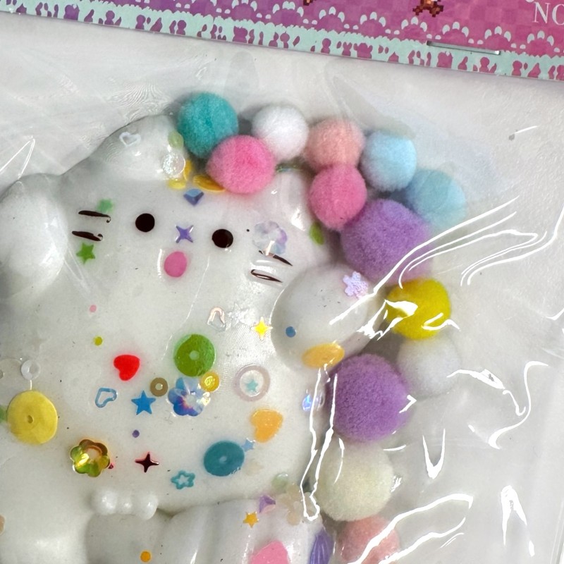 Gniotek antystresowy Squishy Kotek biały z pomponikami 1 szt.